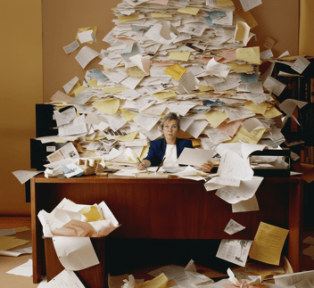 Business Owner Overwhelmed By Paperwork